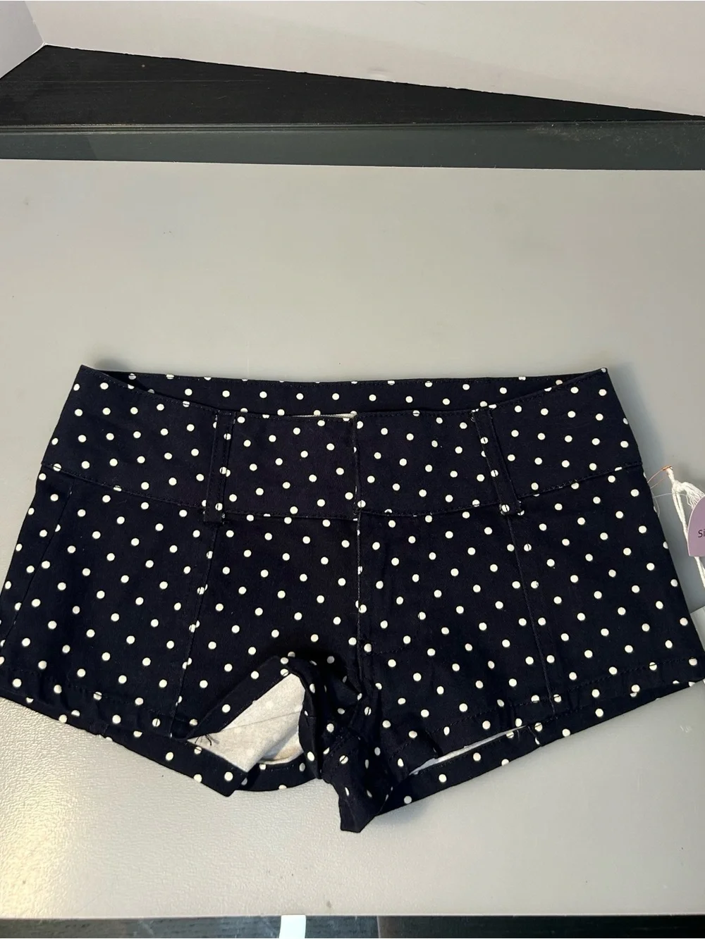 Women’s size XS navy blue and white polka dot shorts ( brand new)